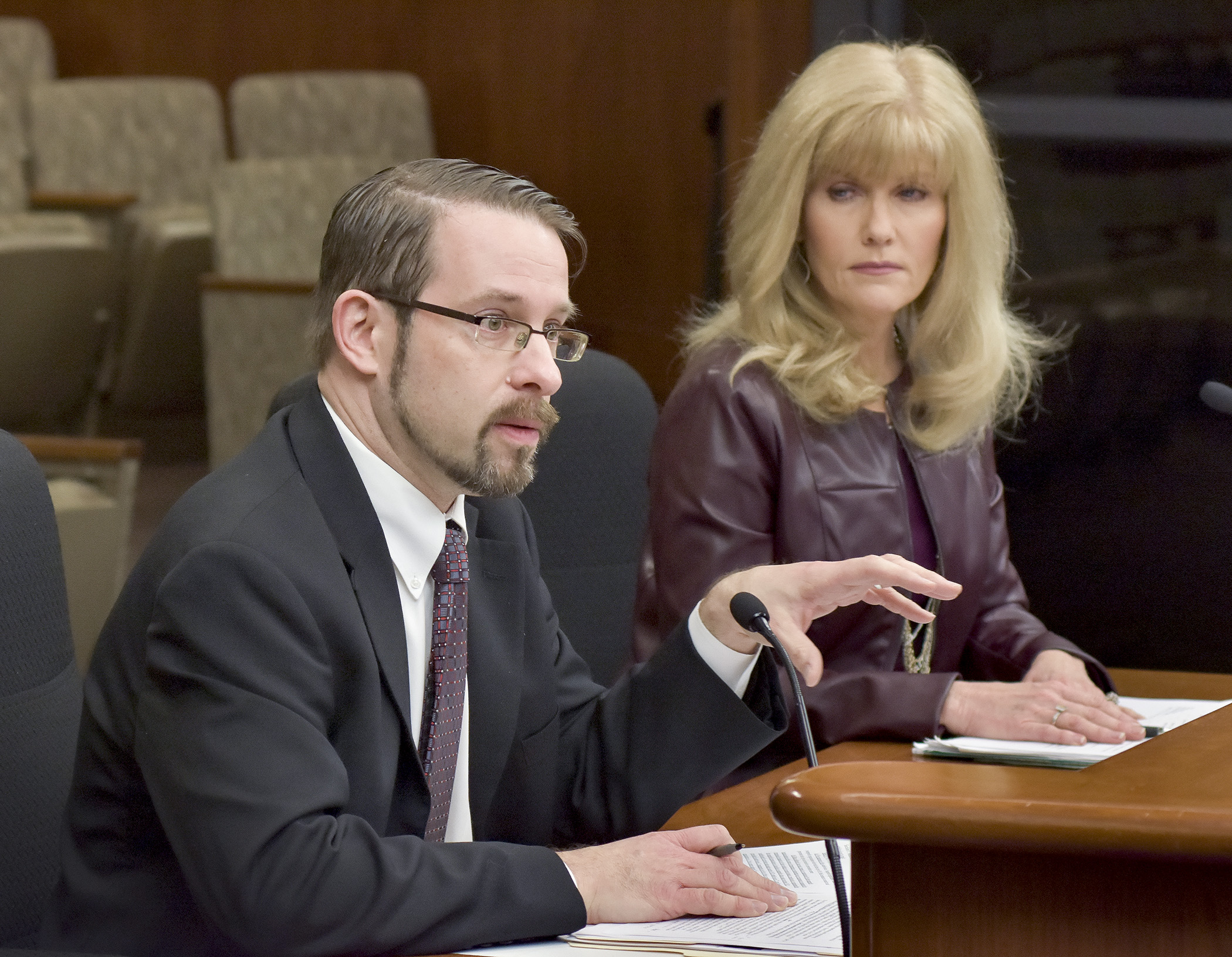 Representing the Minnesota Coalition on Government Information, Matt Ehling testifies before the House Civil Law and Data Practices Policy Committee Jan. 26 during a discussion on a bill sponsored by Rep. Peggy Scott, right, that would clarify convention center data classification. Photo by Andrew VonBank